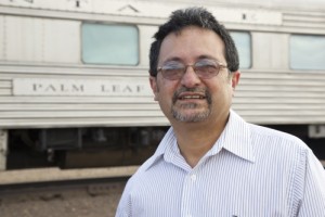 Frank X. Moraga hanging out next to a westbound California Zephyr in Winslow, AZ. Photo by Star Hunter / ©2014